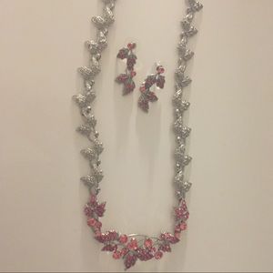 Silver jewelry set with pink stones